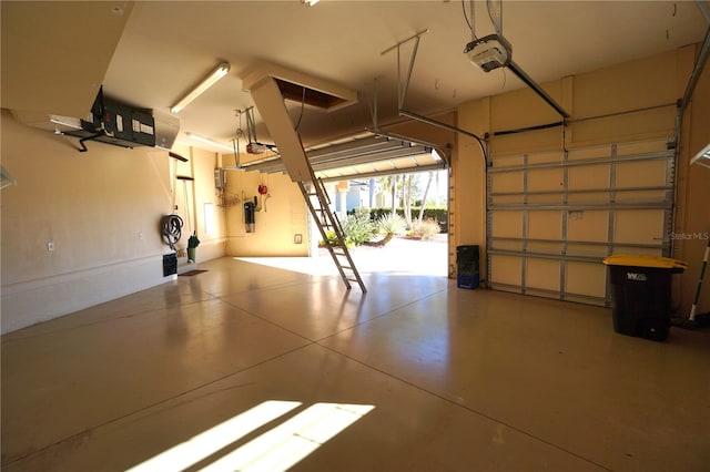 garage featuring a garage door opener