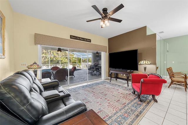 living room with light tile patterned floors and ceiling fan