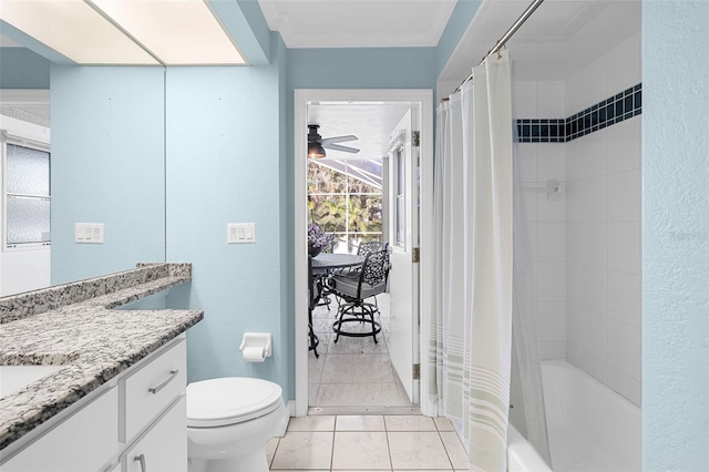 full bathroom with ceiling fan, shower / bathtub combination with curtain, tile patterned flooring, toilet, and vanity