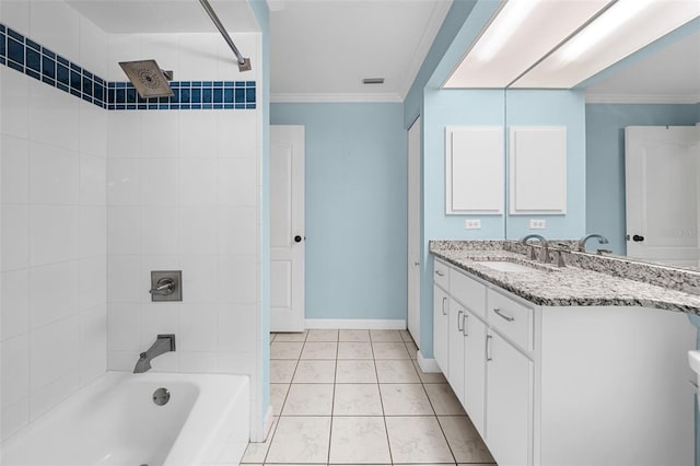 bathroom featuring tile patterned flooring, tiled shower / bath combo, crown molding, and vanity