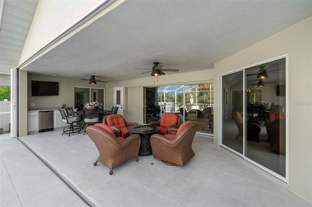 view of patio with ceiling fan