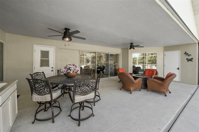 view of patio / terrace featuring ceiling fan