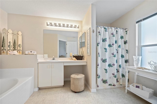 bathroom featuring vanity and shower with separate bathtub