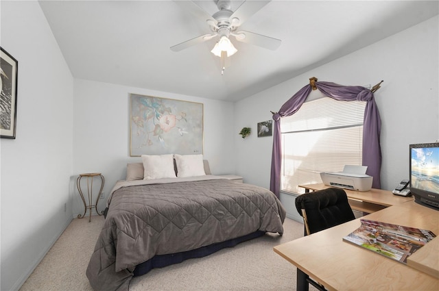 bedroom featuring ceiling fan and carpet floors