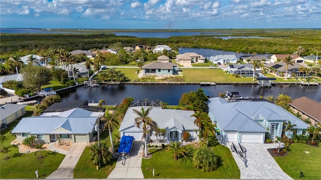 drone / aerial view featuring a water view