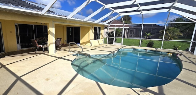 view of swimming pool featuring a patio area and glass enclosure