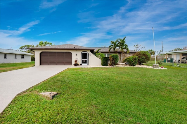 3545 Syracuse St, Port Charlotte, FL 33952 - single story home featuring an attached garage, driveway, stucco siding, and a front lawn