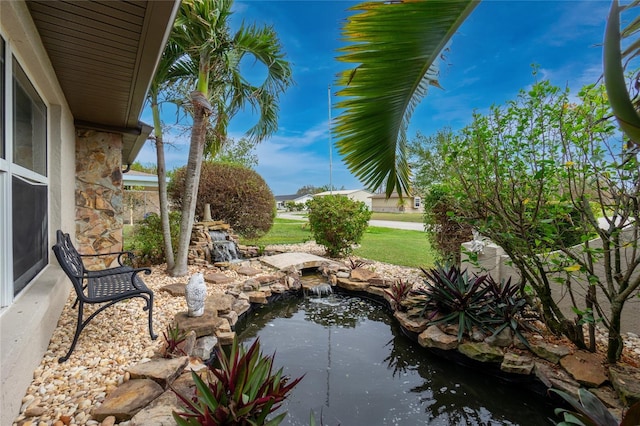 3545 Syracuse St, Port Charlotte, FL 33952 - view of yard with a small pond