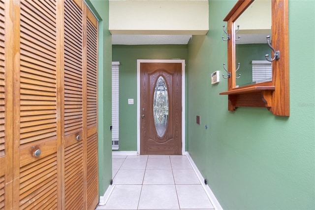 3545 Syracuse St, Port Charlotte, FL 33952 - doorway featuring tile patterned floors and baseboards