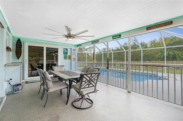 3545 Syracuse St, Port Charlotte, FL 33952 - sunroom with ceiling fan and outdoor dining space