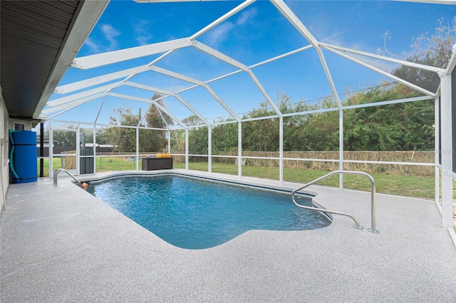 view of pool with a lanai and a patio area