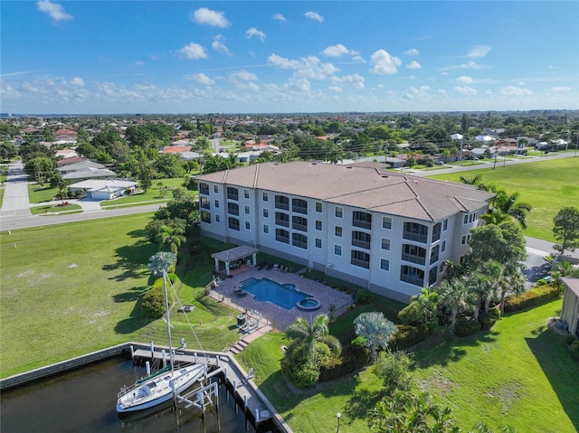 birds eye view of property featuring a water view