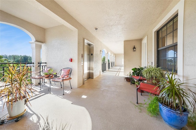 view of patio / terrace with elevator