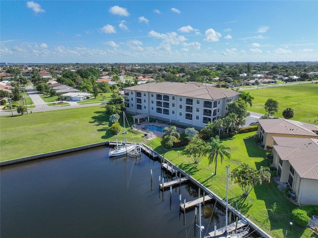 bird's eye view with a water view