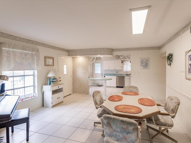 dining area with light tile patterned floors