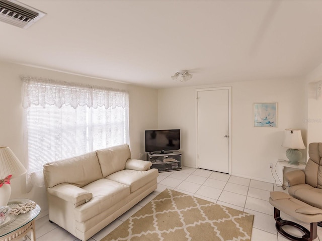 living room with light tile patterned floors