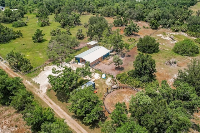 birds eye view of property featuring a rural view