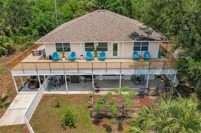 back of house with an outdoor hangout area and a wooden deck