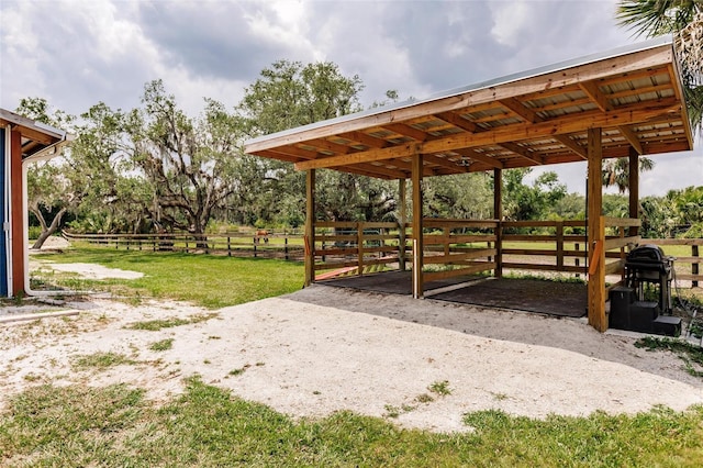 view of property's community with an outdoor structure