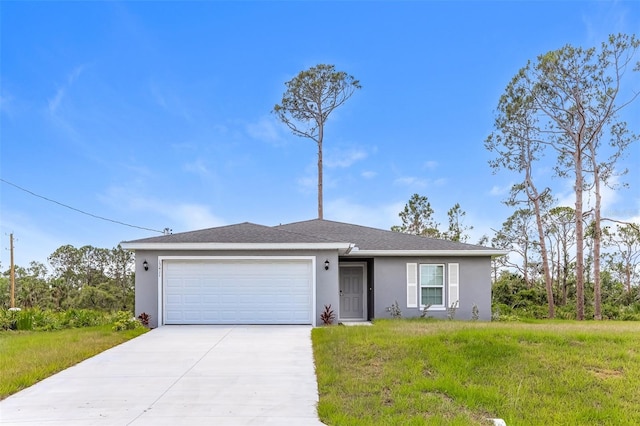 ranch-style home featuring a garage and a front yard