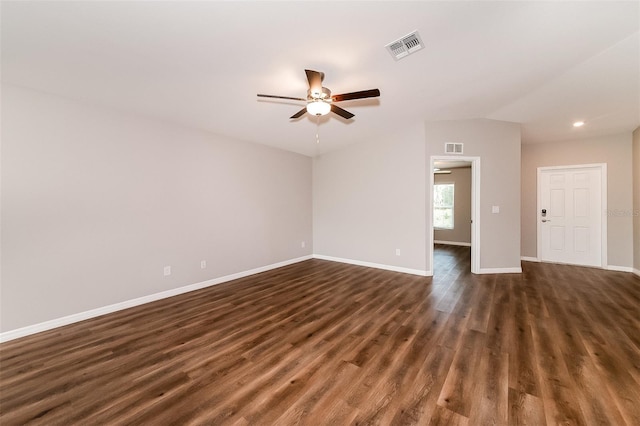 spare room featuring dark hardwood / wood-style floors and ceiling fan