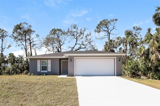 ranch-style home featuring a garage and a front lawn