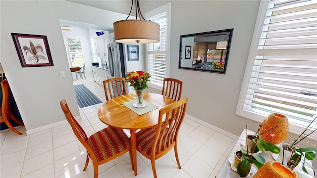 dining room with light tile patterned floors