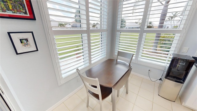 view of tiled dining space