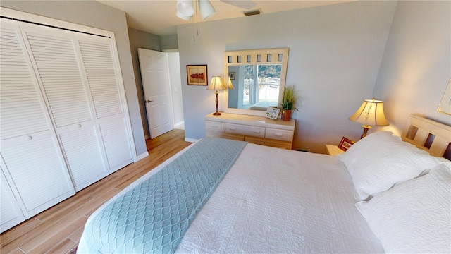 bedroom featuring a closet, ceiling fan, and light hardwood / wood-style floors