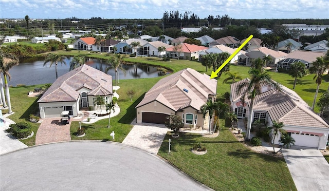 drone / aerial view featuring a water view