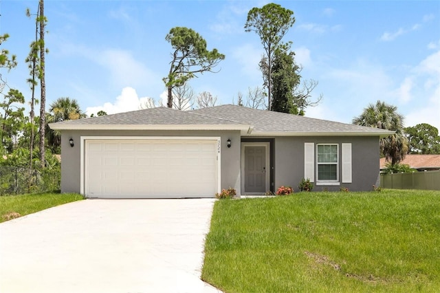 single story home with a front yard and a garage