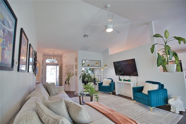 living room featuring ceiling fan and wood-type flooring