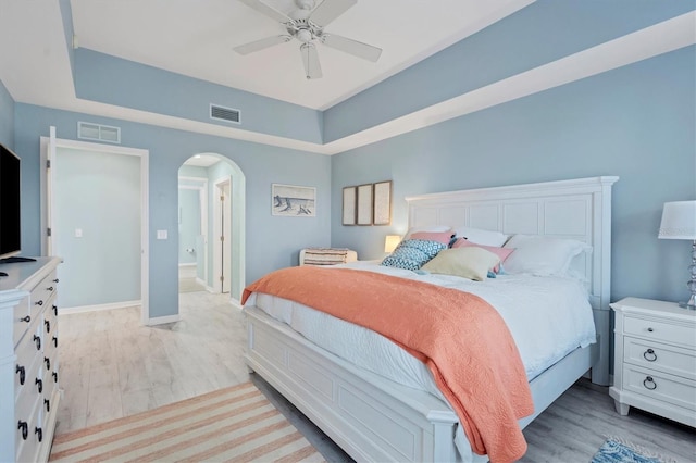 bedroom featuring light wood-type flooring and ceiling fan