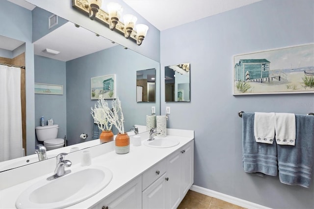 bathroom featuring tile patterned flooring, vanity, toilet, and a shower with curtain