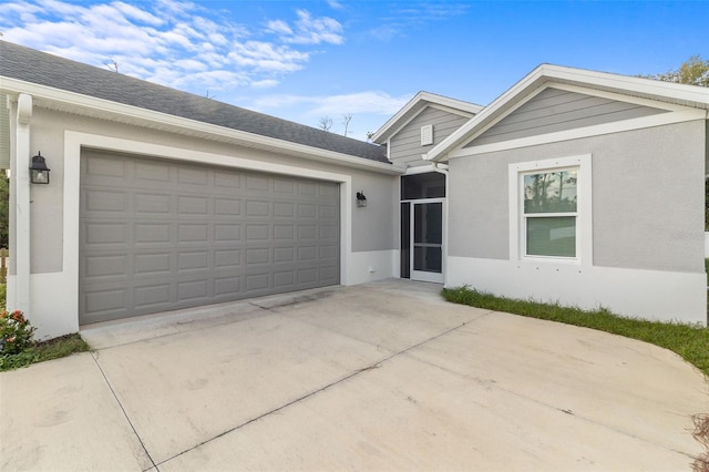 single story home featuring a garage