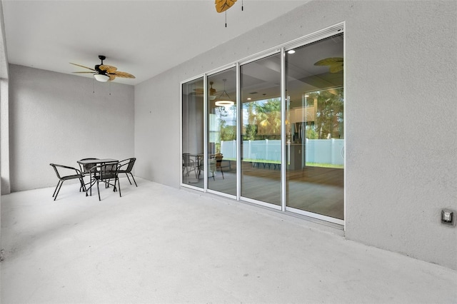 sunroom / solarium with ceiling fan