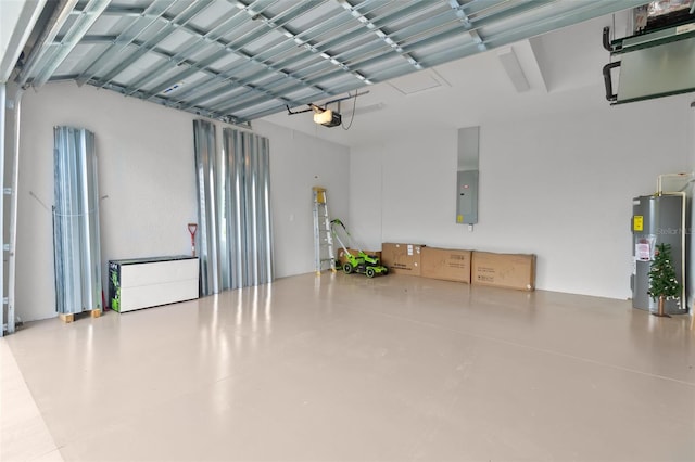 garage featuring water heater and a garage door opener