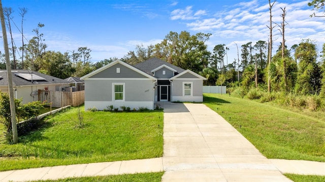 view of front of property with a front lawn