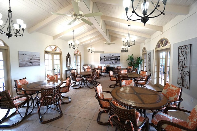 dining area with french doors, ceiling fan, light tile patterned floors, beam ceiling, and high vaulted ceiling