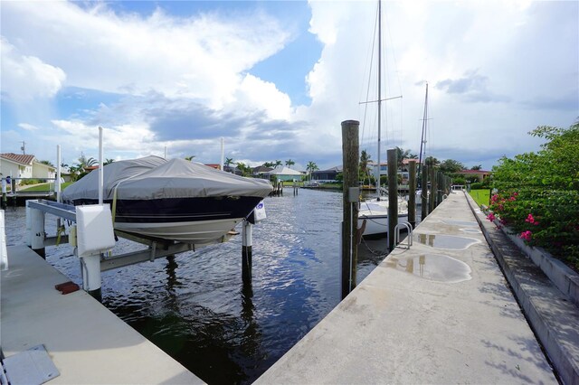 view of dock with a water view