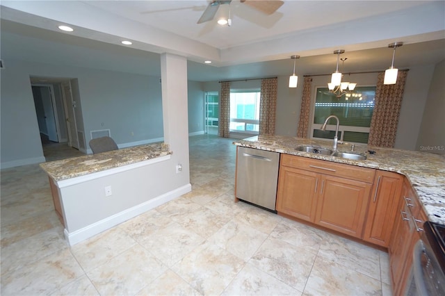 kitchen with ceiling fan with notable chandelier, sink, hanging light fixtures, stainless steel dishwasher, and light stone countertops