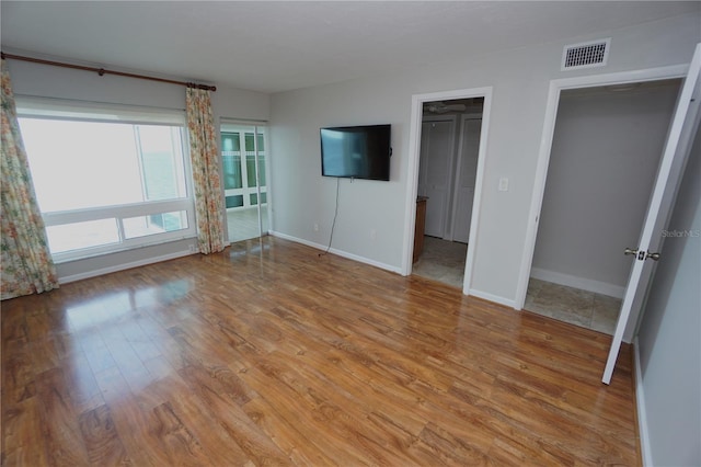 unfurnished bedroom featuring light hardwood / wood-style flooring