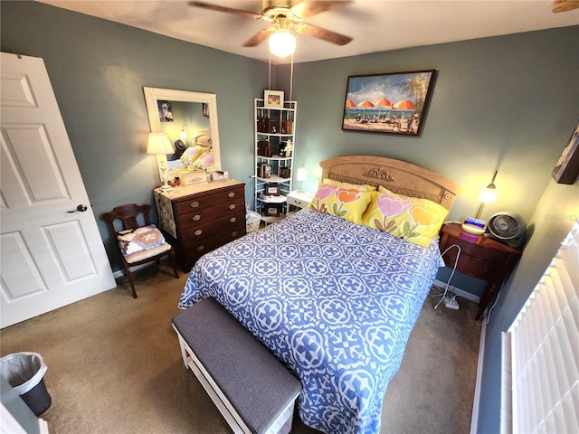 bedroom with ceiling fan and dark colored carpet