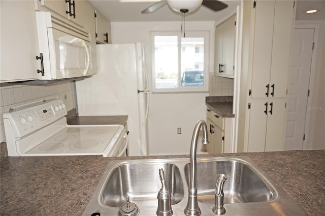 kitchen featuring white cabinetry, sink, ceiling fan, white appliances, and decorative backsplash