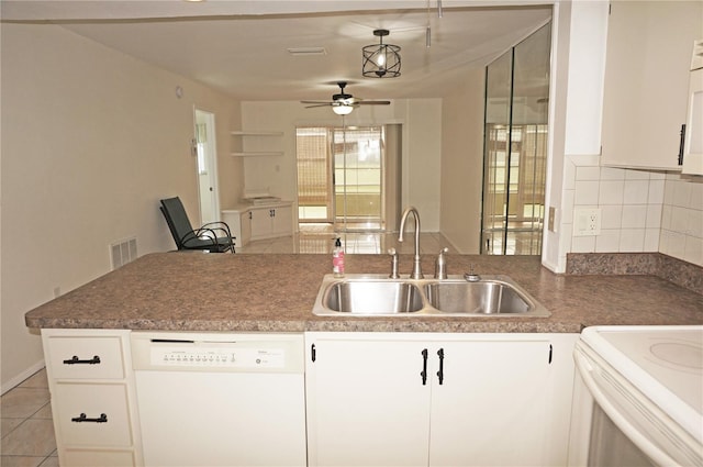 kitchen with white cabinets, sink, white appliances, and ceiling fan