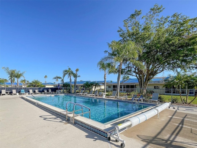 view of pool featuring a patio area