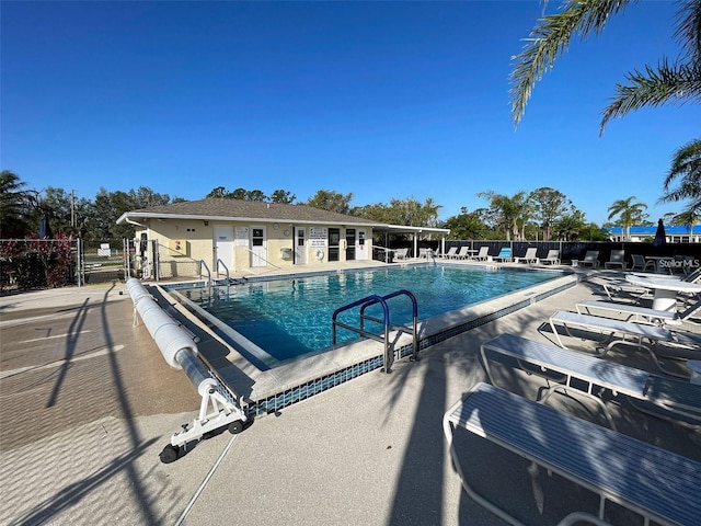 view of swimming pool with a patio