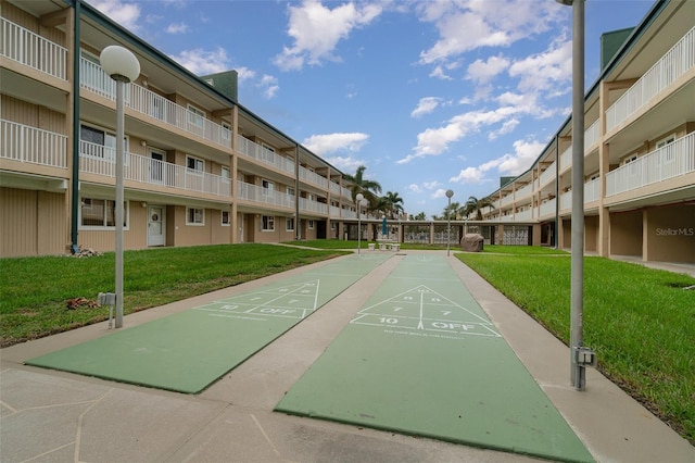 view of community with a lawn