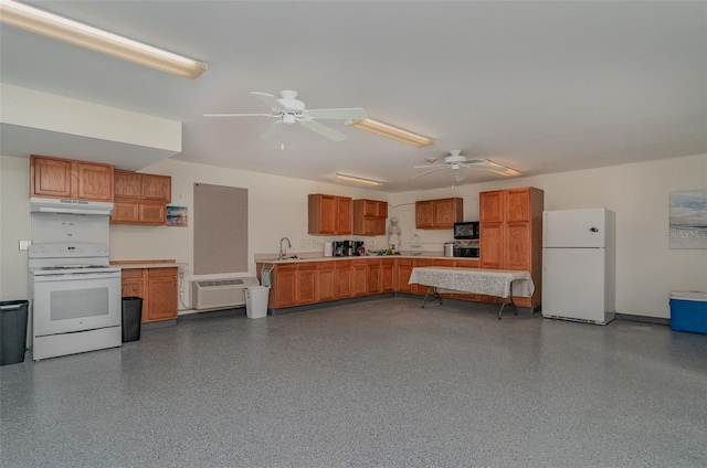 kitchen with white appliances, ceiling fan, and sink