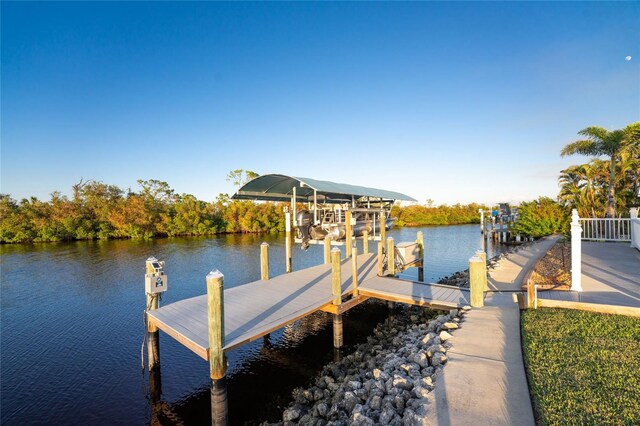 dock area with a water view